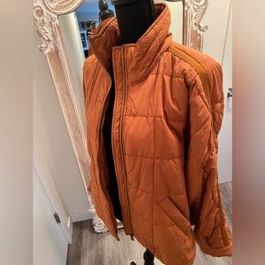 Free people movement orange jacket